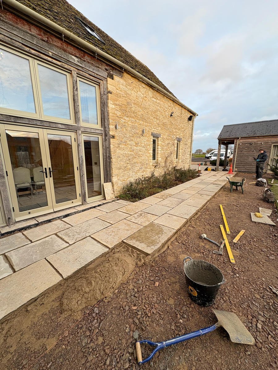 Paving part-laid, with a strip of bare sub-base still to go